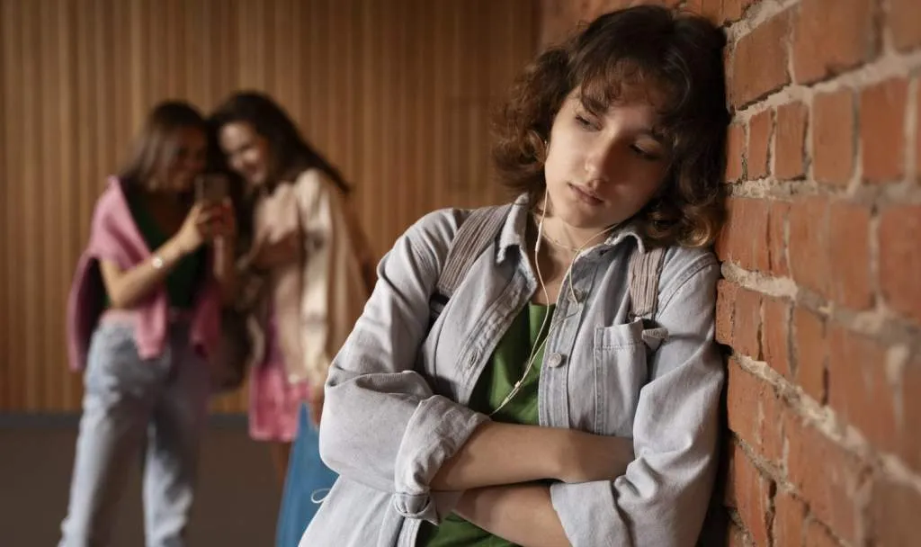 front-view-sad-girl-being-bullied-at-school-1568x931.jpg