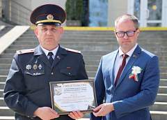 «Работаю добросовестно и по-другому не умею». Имя подполковника милиции Дмитрия Ткачука занесено на Доску почета Октябрьского района г. Гродно